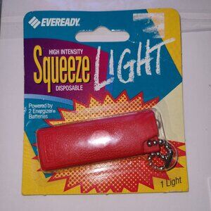 NEW Old Stock 1992 Eveready Squeeze Light Flashlight Keychain Red